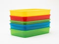 Stack of plastic containers, isolated on white background Royalty Free Stock Photo