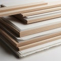 A stack of plywood sheets and panels with a veneer finish, varying in size and Royalty Free Stock Photo
