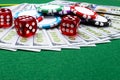 Stack of Poker chips with dice rolls on a dollar bills, Money. Poker table at the casino. Poker game concept. Playing a game Royalty Free Stock Photo