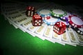 Stack of Poker chips with dice rolls on a dollar bills, Money. Poker table at the casino. Poker game concept. Playing a game Royalty Free Stock Photo