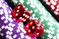 Stack of poker chips with dice rolls isolated background. Poker game concept. Playing a game with dice. Casino Concept for busines Royalty Free Stock Photo