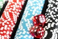 Stack of poker chips with dice rolls isolated background. Poker game concept. Playing a game with dice. Casino Concept for busines Royalty Free Stock Photo