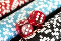 Stack of poker chips with dice rolls isolated background. Poker game concept. Playing a game with dice. Casino Concept for busines Royalty Free Stock Photo