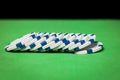 Stack of poker chips on a green table Royalty Free Stock Photo