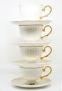 Stack of porcelain tea cups on white background Royalty Free Stock Photo