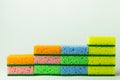 stack of porous multicolored sponge scourers