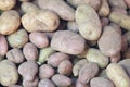 Stack of potatoes on a market stall Royalty Free Stock Photo