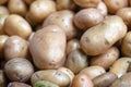 Stack of potatoes on a market stall Royalty Free Stock Photo