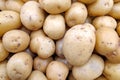 Stack of potatoes on a market stall Royalty Free Stock Photo