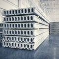 Stack of precast reinforced concrete slabs in factory workshop