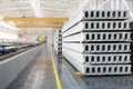 Stack of precast reinforced concrete slabs in factory workshop