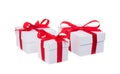 Stack of presents white gifts ribbon red bow isolated on white background Royalty Free Stock Photo