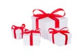 Stack of presents white gifts ribbon red bow isolated on white background Royalty Free Stock Photo