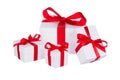 Stack of presents white gifts ribbon red bow isolated on white background Royalty Free Stock Photo