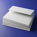 Stack of pristine white paper sheets on blue background Royalty Free Stock Photo