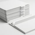 Stack of pristine white paper sheets with a single clip Royalty Free Stock Photo