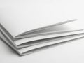 Stack of pristine white paper sheets with visible perforations on a flat surface Royalty Free Stock Photo