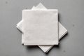 Stack of Clean White Paper Napkins on Gray Background Royalty Free Stock Photo