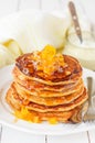 A Stack of Pumpkin Pancakes Topped with Pumpkin-in-Syrup Preserves Royalty Free Stock Photo