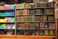 Stack of Quran on the shelf. Quran religious book stacked in shelf for sale. Available in Various languages in a book store.