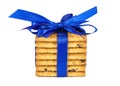 Stack of raisin cookies with blue ribbon