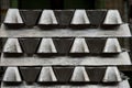 Stack of raw aluminum ingots in aluminum profiles factory Royalty Free Stock Photo