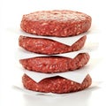 Stack of raw beef burger patties on parchment paper Royalty Free Stock Photo