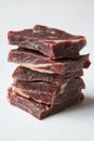 Stack of Raw Beef Steaks on White Background Royalty Free Stock Photo