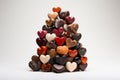 a stack of real heart-shaped objects mimicking the heart emoji