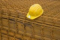 Stack of rebar grids with yellow helmet Royalty Free Stock Photo