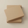 A stack of rectangular brown cardboard sheets on a light, neutral background. The Royalty Free Stock Photo