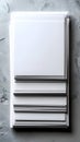 Stack of Rectangular White Paper on Textured Gray Surface Overhead Shot Royalty Free Stock Photo