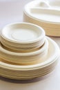 Stack of Recycled Paper Plates. Biodegradable cutlery for Events And Parties