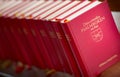 Stack of red bible books in church. Sweden, Europe