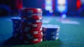 Stack of Red and Blue Casino Chips on Green Felt Table Royalty Free Stock Photo