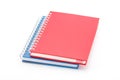 Stack of red and blue color notebooks.