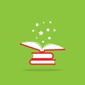 Stack of red books and open book with white stars flying out. Isolated on green background Royalty Free Stock Photo