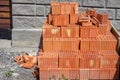 stack of red brick : masonry brick wall work detail Royalty Free Stock Photo