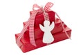 Stack of red Christmas presents with white angel i Royalty Free Stock Photo