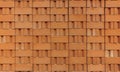 Stack of red clay bricks