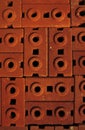 Stack of red clay bricks