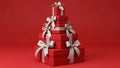 Stack of red gift boxes with white ribbons Royalty Free Stock Photo