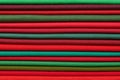 Stack of red and green fabrics as a vibrant background image Royalty Free Stock Photo