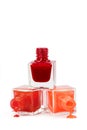 Stack of red nail polish isolated on white background Royalty Free Stock Photo