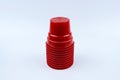 Stack of red plastic cups isolated on white background Royalty Free Stock Photo