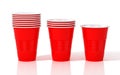 Stack of red plastic cups.