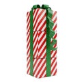 Stack of Red and White Striped Gift Boxes with Green Ribbons Royalty Free Stock Photo