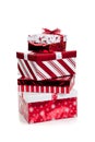 Stack of red and white wrapped Christmas presents