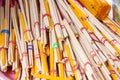 Stack of red and yellow incense sticks in a buddhist temple.Thai Royalty Free Stock Photo