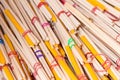 Stack of red and yellow incense sticks in a buddhist temple.Thai Royalty Free Stock Photo